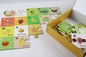 I bambini pavimentano i giochi educativi del puzzle della frutta dell'alfabeto